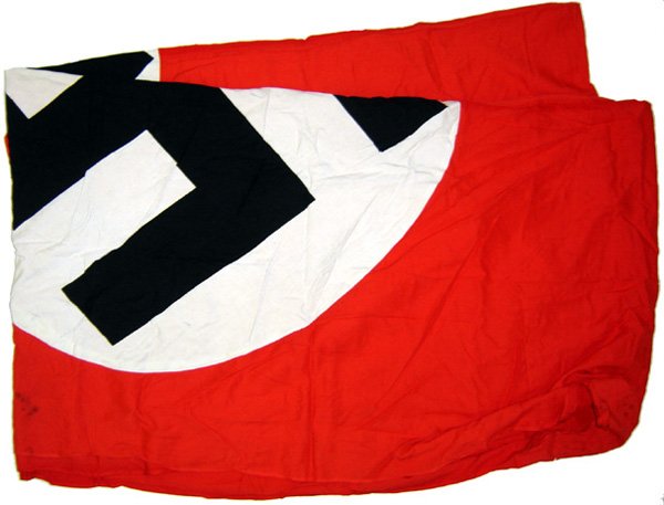 German WWII City building flag: City building banner – with a 44 1/2" diameter white disc. Two holes on border and slight stains. Double sided. 192" x 60".