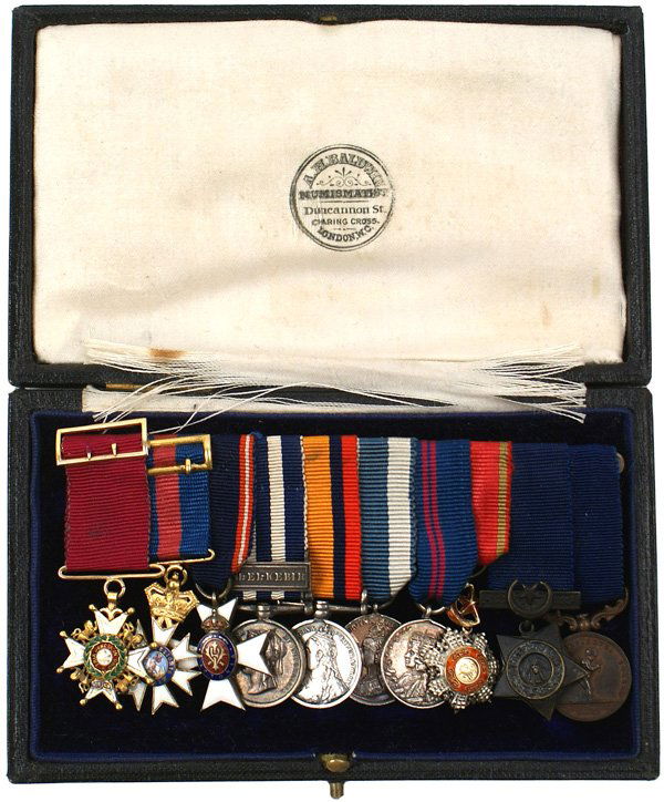 Cased miniature medal bar for British Admiral: B-137 - Great Britain. Cased miniature medal bar of British Admiral Sir Arthur William Moore. High quality decorations include: (1) Order of the Bath - Knight Commander - gold with buckle suspender. (