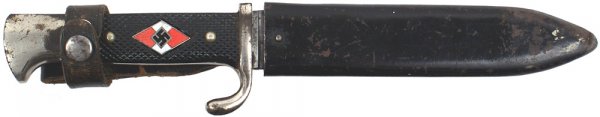 German WWII Hitler Youth dagger: D-26 HJ (Hitler Youth). Enameled red/white diamond with a swastika - set into a checkered black plastic grip. Nickeled "bird head" pommel (worn from strap) and crossguard. "Blut und Ehre!" on gray bla