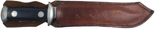 U.S. WWII combat knife: D-54 WWII combat knife. Clean steel pommel, short crossguard and two large rivets on wood grips. 7 3/4" blade which widens to 1 3/8" wide at the "clipped" point. Has been sharpened. With period leathe