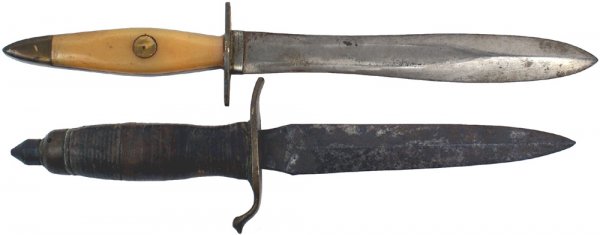 Lot of 2 U.S. fighting knives: D-57 Lot of 2 fighting knives: (1) US WWII - made with the 6 1/4" double edged blade and steel finial from a 1918 combat knife. Blade has dark patches and some pitting. Brass cross guard with a turned