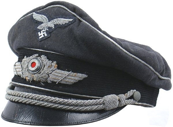 German Luftwaffe officer peaked cap: E-122 Luftwaffe officer. High peaked, blue-gray wool body with a black band. Relief silver bullion eagle/swastika and winged wreath/metal rosette. Silver bullion chin cord. Brown leather sweatband. So
