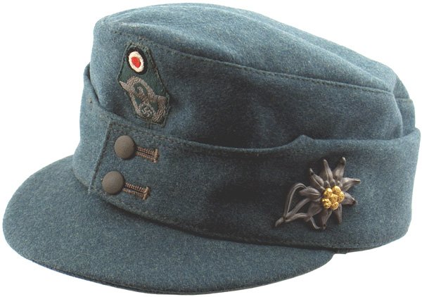 German Police Mt. M43 type cap: E-143 Police Mountain cap. Identical to the M1943, but with a short brim. Two-button front. Rosette and Police eagle/swastika/oak leaf wreath trapezoid insignia. Metal "edelweiss" sewn to left side. B
