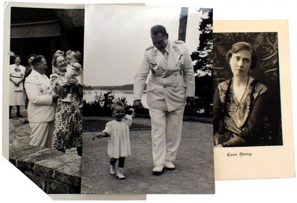 Lot of 2 Hermann Goring photos: A-12 Lot of 2 Goring related photos: (1) Goring in white uniform walking with his young daughter, Edda. Reverse has Heinrich Hoffmann stamping and "Photo - Archiv GeneralFeldMarschall Goring. (2) Gori