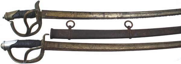 Lot of 2 M1860 Civil War cavalry sword: K-27 - Lot of 2 M1860 Civil War cavalry swords: (1) Sword with an old nickeled pommel and 3-branch guard. Black tape wrapped grip. Well used 35 1/2" blade has old plating which has turned gray. Lower 