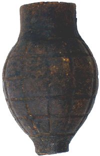 British WWI Mills grenade: M-43 - British WWI "Mills" grenade. Checkered round iron body with a top finial and round bottom base. Shows age. II-.....$50.00