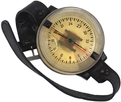 German Luftwaffe pilot compass: N-28 - Luftwaffe pilot's wrist compass. Bakelite base with a rotating clear encasement with a "floating" directional disc "bubble". Leather wristband. II+.....$125.00