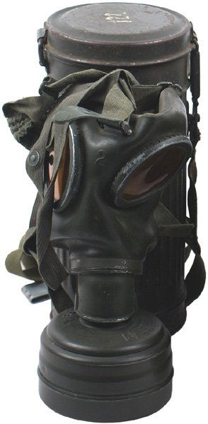 German WWII Army gas mask: N-29 - Army gas mask. Rubberized mask with tinted lenses - dated "1940". Eagle/swastika stamped filter can complete with straps. Extra lenses inside of lid. 70% O.D. finish on fluted canister. Web bel