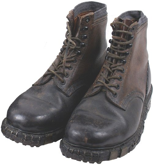 German WWII Mountain Troops boots: N-40 - Mountain trooper's boots. Lace-up ankle high, with a reinforced heel and toe. Heavy soles, with large hobnails and perimeter relief iron "teeth" and brass flanges. With original rawhide laces. 