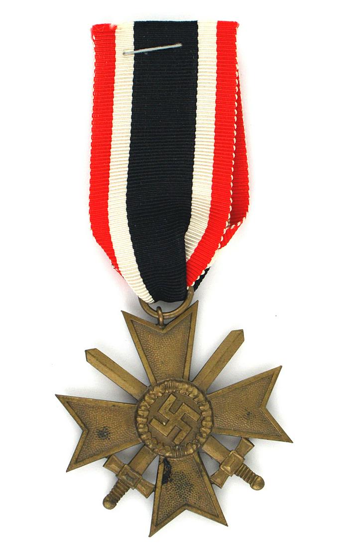 German WWII War Merit Cross with Swords: B-063 German WWII War Merit Cross with swords - 2nd Class. Dark patina. Ring marked. Replaced original ribbon. II