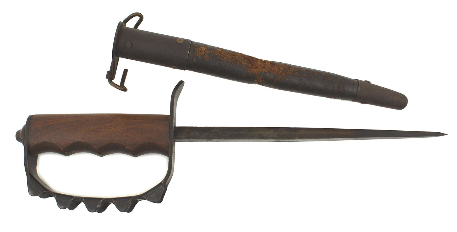 US WWI M1918 trench knife: D-055 US WWI M1918 trench knife. One - piece steel reverse "D" knuckle-bow with 5 flange type projections on each outer border. Marked "AC. Co. - USA - 1917". One piece, finger fitted wood grip with a