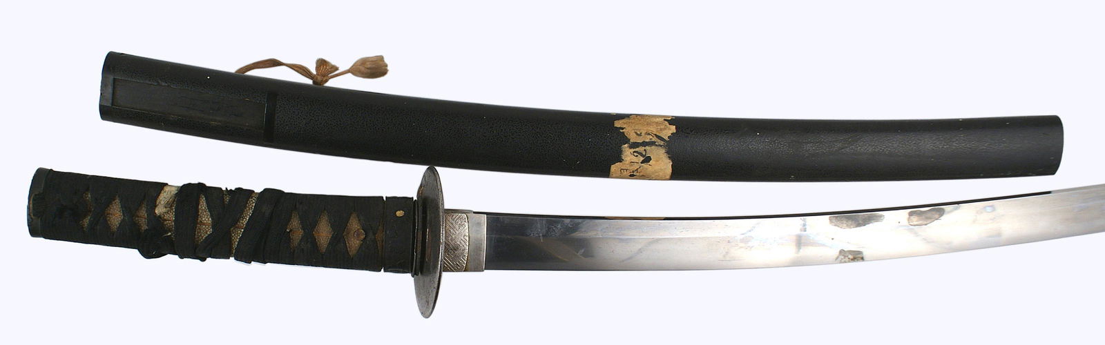 Japanese Wakizashi short sword 18th 19th Century: D-168 Japanese Wakizashi (short sword) 18 7/8" curved "fish-belly blade". Nice "waves" type temper line. Basically a clean blade except for a visible thumb print and three "ink like" stains (probably