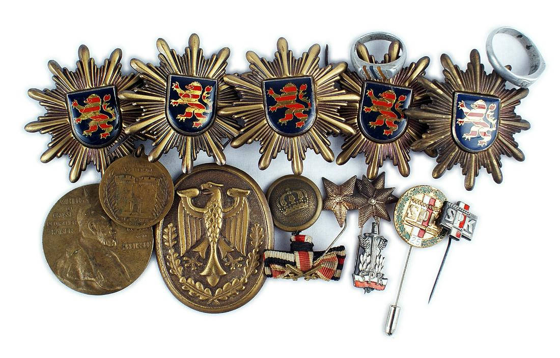 Lot of European insignia German WWI Italian: H-151 Lot of miscellaneous European insignia. (1) German WWI - two patriotic rings, ribbon, uniform button. (2) Prussian Wilhelm Centennial Medal (no ring or ribbon) and a French Verdun Medal (no ribb