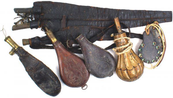 Lot of shot powder flasks: M-80 Lot of shot/powder flasks. Includes: (1) Brass voluted powder flask. Circa 1850. Shows wear. (2) Three leather shot flasks. One has embossed game and a brass spout, one is similar, but missing th