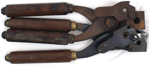 Lot of 2 Winchester bullet molds: M-96 Lot of 2 Winchester bullet molds: (1) Marked "MANUFACTURED BY THE WINCHESTER REP. ARMS CO. - NEW HAVEN CONN. USA". Retains most of the blue finish (should be cleaned). Marked "32.5". Wood grips. 