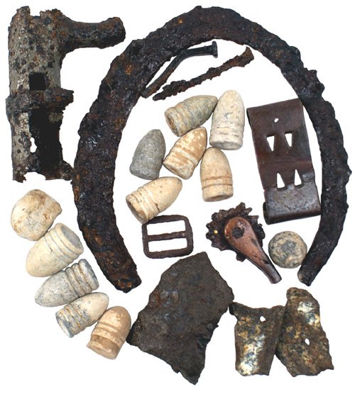 Lot of Civil War relics spur shell etc: K-163 Lot: (1) Rowel from spur and hat buckle (found on Culps Hill). (2) Horseshoe and belt keeper (found in peach orchard). (3) Mini ball and other projectiles (found at Plum Run Creek). (4) Parrot s