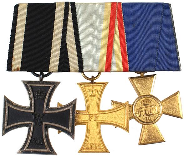 German WWI 3 medal bar 1914 Iron Cross 2nd Class: B-19 Three medal bar: 1914 Iron Cross – 2nd Class (darkened patina on silver frame), Mecklenburg – Schwerein Military Service Cross – 2nd Class and a Prussian 25-yr. Service Medal. II+