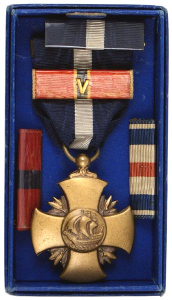 U.S. WWII Navy Cross medal in box: B-159 Same - with a full wrapped brooch. Pinned to the original backing card, with a WWII blue paper box. Also with four ribbon bars: Navy Cross, Silver Star, Bronze star with "V" and Navy Good Conduc