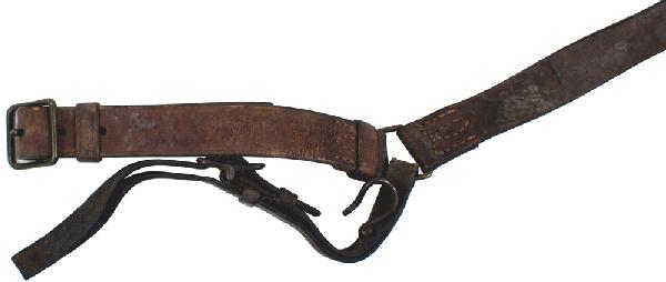 Japanese WWII officer sword belt: D-102 Japanese officer's brown leather sword belt. Open brass buckle and belt hook with an adjustable hanger strap. Also with a copy of the G.I. "bring back" certificate listing this item, as well as 
