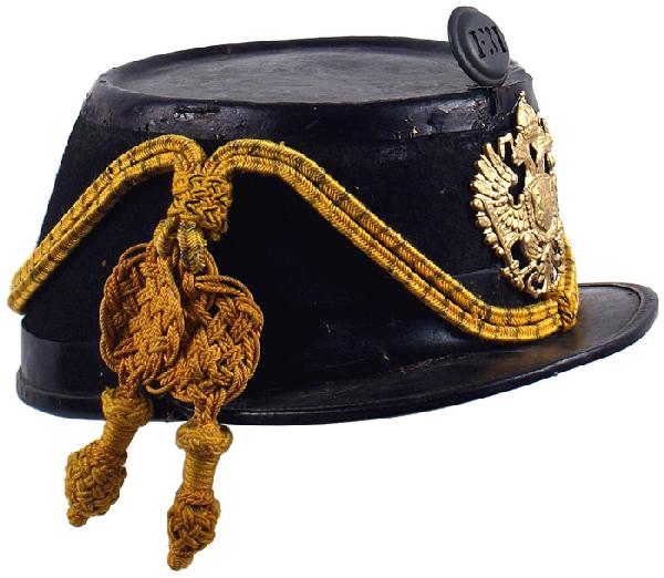 Imperial Austrian Hussar EM shako helmet: E-6 Hussar EM shako. Military issue type – 3 3/8" high in front and 4 7/8" high on the back. Black felt body with a leather brim, top and 1 1/8" strip around base. Gilt brass double-headed crowned e