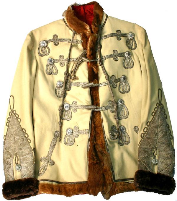 Austrian Hussar officer dress Peltz Attila tunic: F-14 Ranking Hussar officer's dress "Peltz Attila". Soft off-white fabric with five rows of flat silver bullion wire "frogging", button loops and designs on lower front. 2 1/8" desi