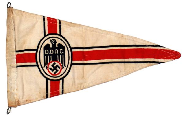 German Automobile Association pennant: H-105 German Automobile Association fender pennant. Black/white outlined red cross with a large oval bearing a black eagle with "D.D.A.C."/swastika. Snap hook and figure "8" hook. II