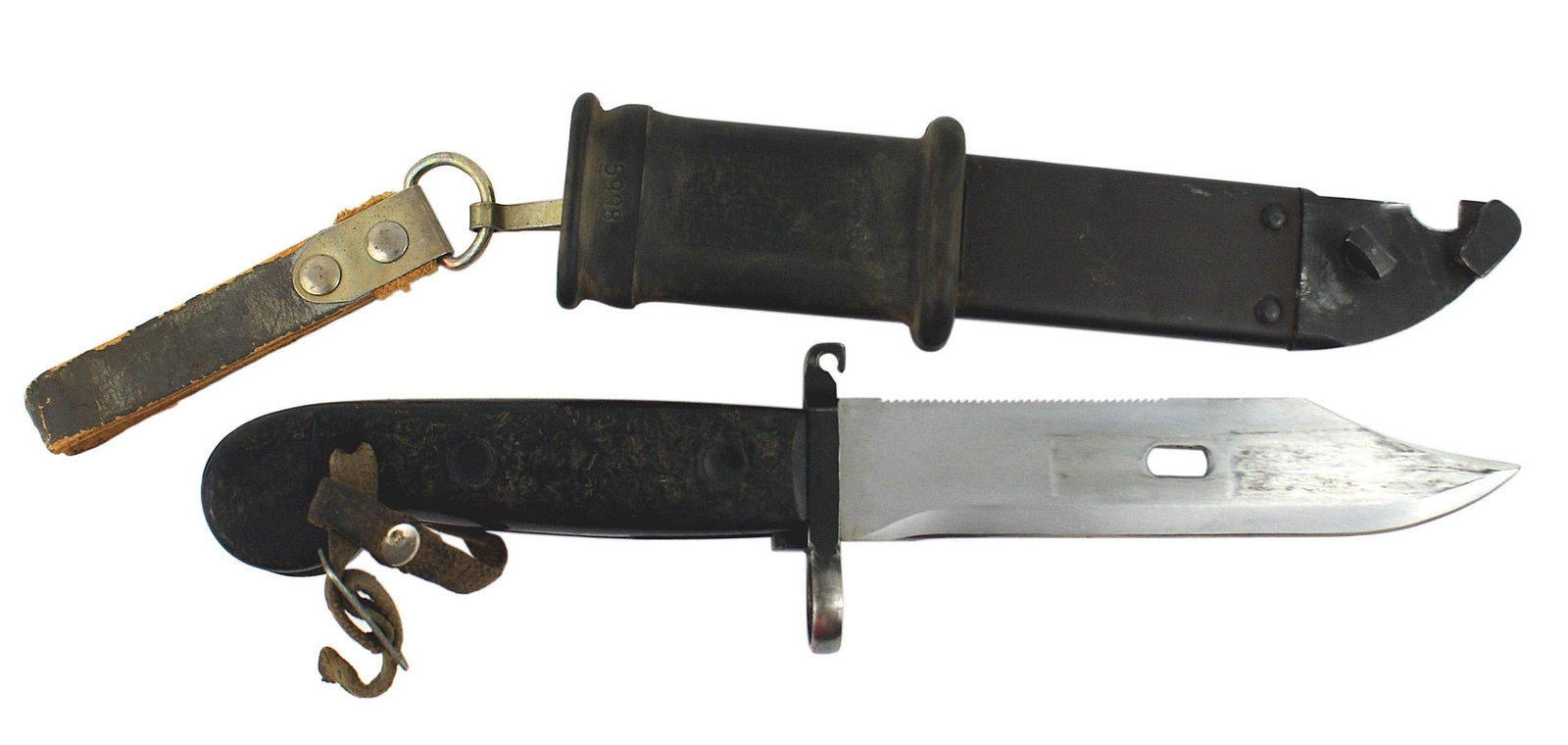 Soviet Russia old pattern Shtik bayonet: D-054 Soviet Russia "old pattern" Shtik K... A...47 bayonet. No fuller on the 5 3/4" bowie type blade with a serrated spine and elliptical hole (for attaching scabbard to use as wire cutters). Purple-