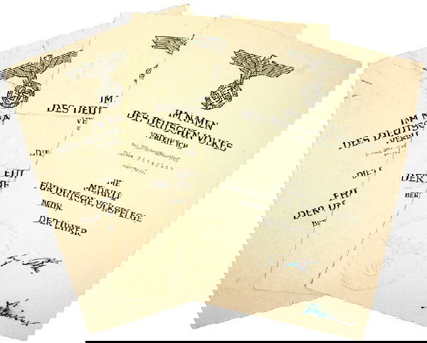 Lot of 3 German WWII Citations for Mother's Cross: Q-2 Lot of 3 Award Citations for medals: (1) German Mother’s Cross –Second Class. Named and dated “20. Mai 1945”. Facsimile “Hitler” and “Meissner” signatures. Predated and never issue