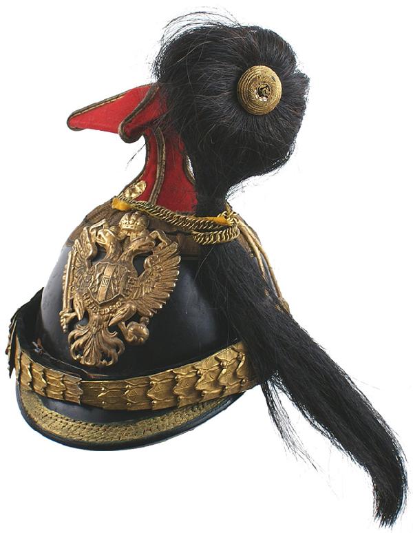 Austrian Uhlan officer czapka: E-7 Austrian Uhlan officer’s “czapka”. Same as the above – with a three black stripe gold “tape” trim, “linden leaves” gilt brass chinstraps, gold cord trim on top, gilt visor trim, et