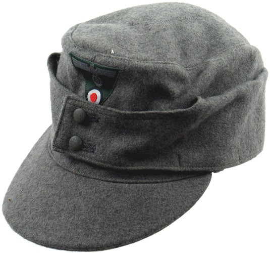 German WWII Army M1943 EM cap: E-155 Army M1943 EM cap. "Ersatz" type material. Machine sewn bevo trapezoid insignia. Silver-gray silk type lining is stamped "CLEMENS WAGNER - SEP. 43…". I