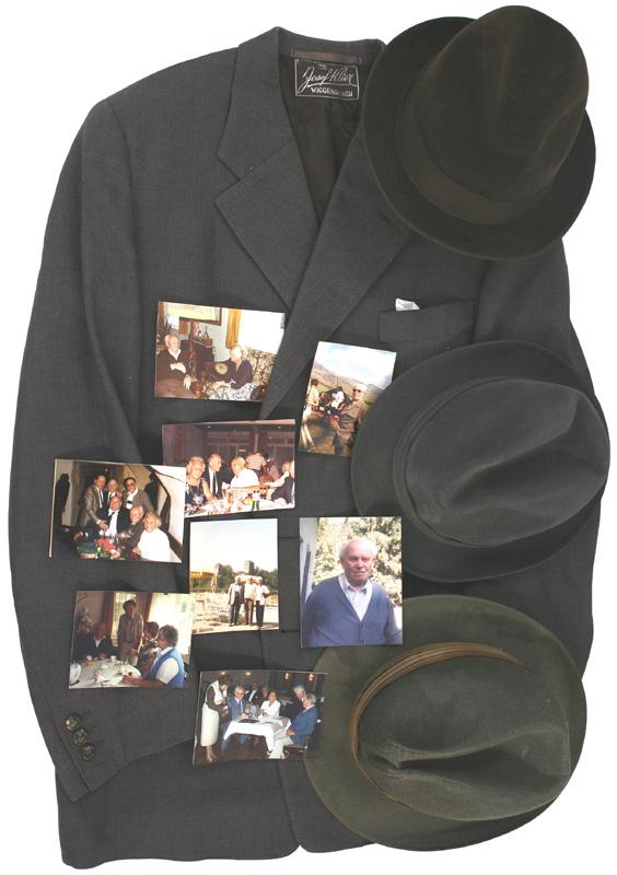 Lot of jackets and hats etc Hitler Pilot Baur: S-7 Lot of personal attire/miscellaneous postwar items of Hans Baur. Includes: (1) Gray-brown sport jacket. Silk lining with tailor’s label. (2) Gray felt dress hat. (3) Brown felt dress hat. Sweatb