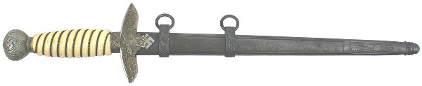 German WWII Luftwaffe 2nd Model dagger: D-20 Luftwaffe 2nd Model. Aluminum oak leaf/swastika pommel and a flying eagle/swastika crossguard. Silver wire wrapped yellowing white grip. Blade has been cleaned and has some subdued “water stain