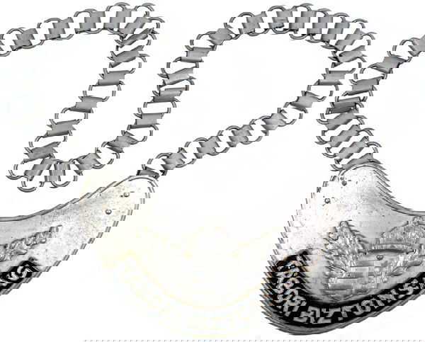 Hungarian Army WWII Military Police gorget: H-188 Hungarian Army WWII Military Police gorget. Dull silvered crescent shaped shield with affixed crowned Hungarian arms and plate bearing “TOBORI BIZTONSAG”. Three suspension hooks on reverse �