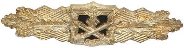 Reproduction Army/W-SS Combat Clasp Silver: H-205 Reproduction Army/W-SS Combat Clasp in Silver. Eagle/swastika/crossed bayonet and grenade, with a darkened backplate, on center of an oak leaf cluster. Age-toned. Reverse marked "FLL". Horizonta