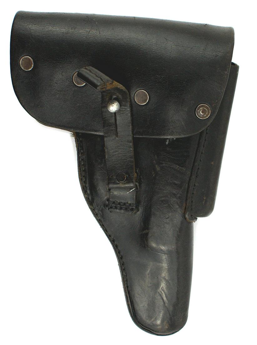 German post-war P38 black leather pistol holster: M-011 German post-war P-38 black leather pistol holster. Four flat rivets and stud for locking strap on flap. Magazine sleeve on side. Belt sleeve on back under flap. Well marked. II