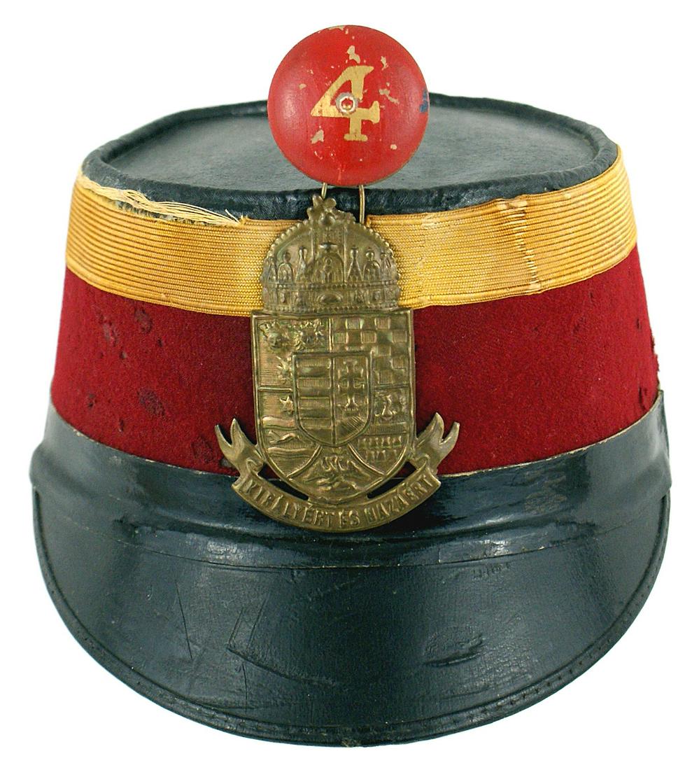 Imperial Hungarian Sergeant rank field shako: E-008 Imperial Hungarian Sergeant rank field shako. Deep red felt body with a 7/8" ribbed yellow - gold band along the top (stained and one section replaced). Original 3" x 2 1/4". St. Stephen's Crown