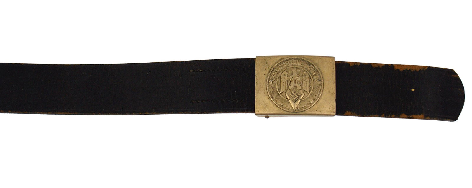 German WWII Hitler Youth belt and buckle: F-024 Hitler Youth brown leather belt and buckle. Darkened patina on the nickeled one-piece buckle. Relief eagle/diamond/ swastika and "Blut und Ehre". Belt is marked "HANS BRERME-WALSRODE 1934". Size