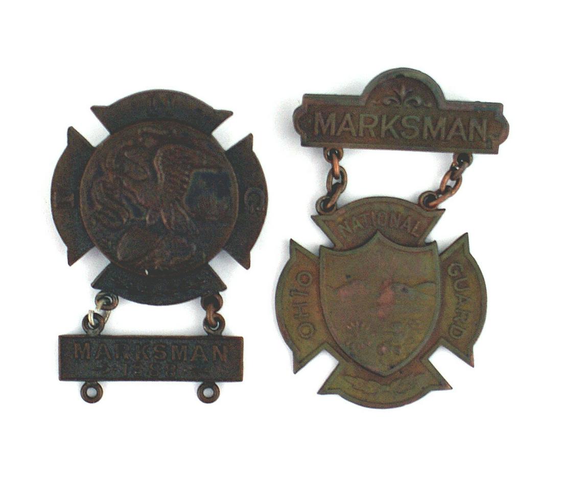 Two US National Guard shooting awards IL OH: B-209 Lot of 2 State National Guard shooting awards: (1) Illinois. Bronze patriotic Civil War eagle/shield and "1863-1913" on a cross with "ING". Reverse engraved "H.A. PATTERSON". Pin-back , suspende