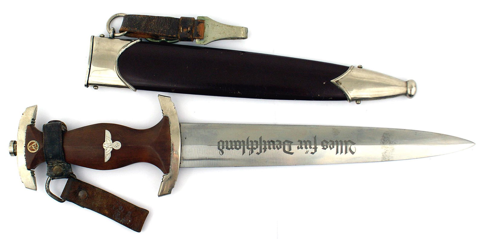 German WWII SA dagger: D-001 German Third-Reich SA dagger. Rosewood grips with a silver eagle/swastika and SA insignia. Nickeled horizontal pommel and crossguard. Both show minute "dimples" along the edges against the wood