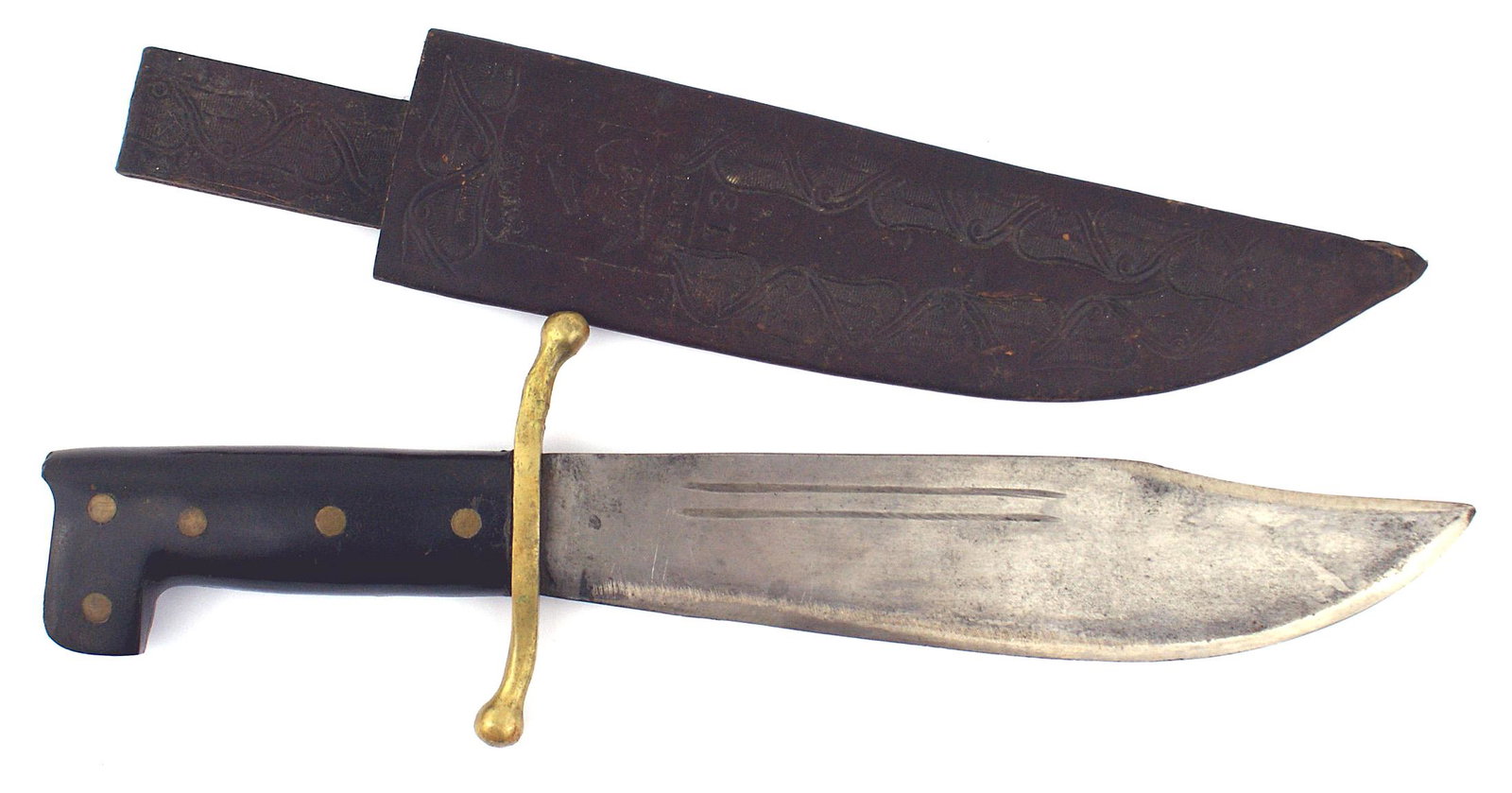 US WWII V44 Survival Knife: D-031 US WWII V-44 Survival Knife. Age darkened 9 3/8" bowie type blade marked with logo and "COLLINS & Co. - LEGITIMUS - MADE IN USA. - No. 18". Black composition handle with a brass "S" shaped guard