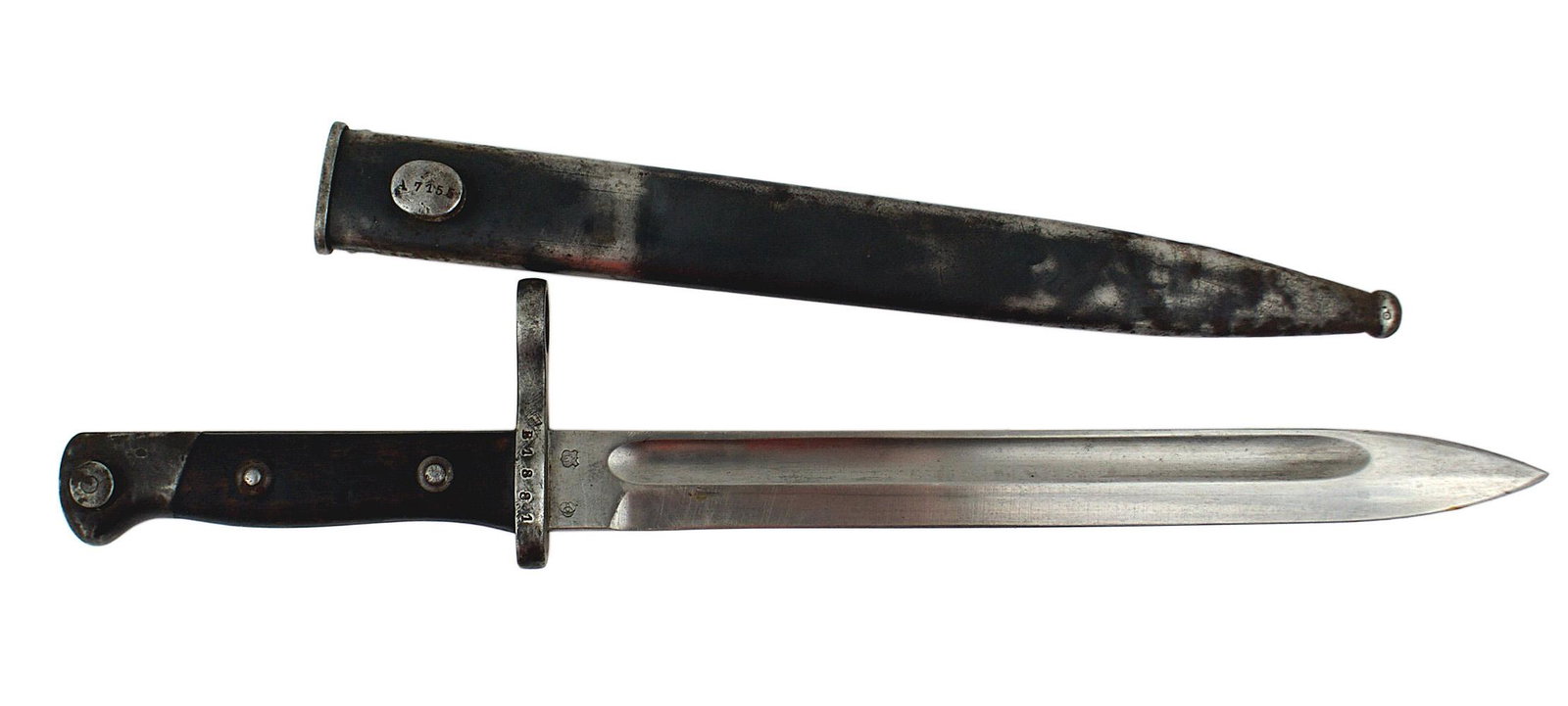 Chilean used M1895 bayonet variant: D-039 Chilean used M1895 bayonet variant. Longer wood grip, higher muzzle ring, and oval frog hook. Clean 9 7/8" blade with star on shield marking. Some dents on lower part of scabbard. About II