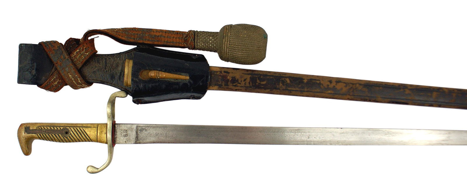 Imperial German 1870 dress bayonet: D-044 Imperial German, Circa 1870 Dress Bayonet. Unslotted brass "bird head" pommel. Missing spring catch. Nickeled "S" guard with a muzzle ring. 19 1/4" straight blade with a floral design etched bla