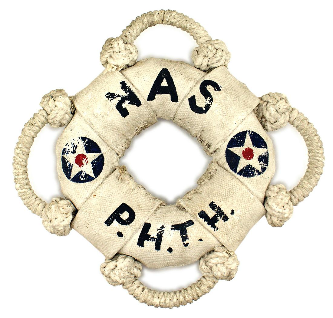US WWII Navy souvenir life preserver doughnut: S-014 WWII US Navy souvenir life preserver - "doughnut" with four stiffened rope "handles". All white with black painted letters "NAS, P.H.T.H. " (Naval Air Station, Pearl Harbor Territory Hawaii.) Al