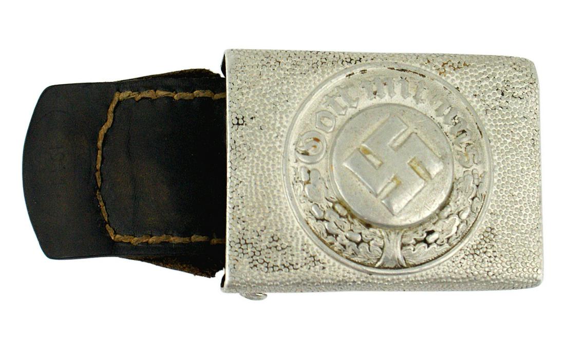 German WWII Police belt buckle: H-015 WWII German aluminum Police belt buckle. Relief swastika and "Gott Mit Uns". Leather tab dated "1941". II