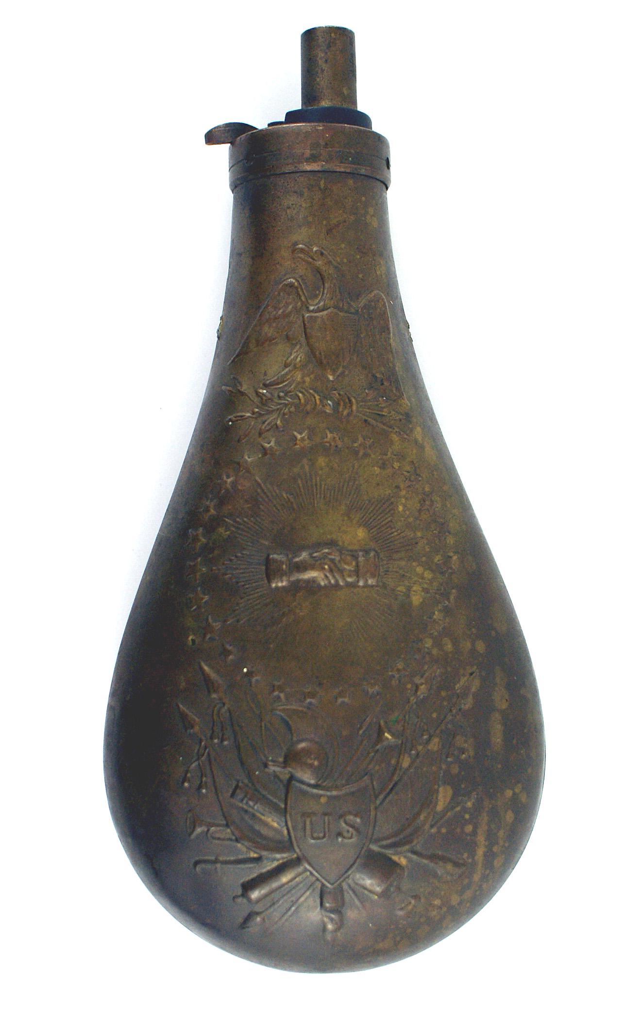 Reproduction US Peace Flask: H-126 Reproduction US mid-century "Peace Flask". Embossed early eagle, clasped handshake, panoply of arms, "US" shield, etc. Aged patina. Missing both small side suspension rings. II