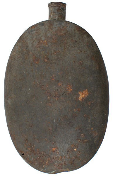 Civil War Period water bottle tin canteen: K-59 Civil War Period "water bottle" type tin canteen. Oval shape with a spout. Some rust "patches". II-