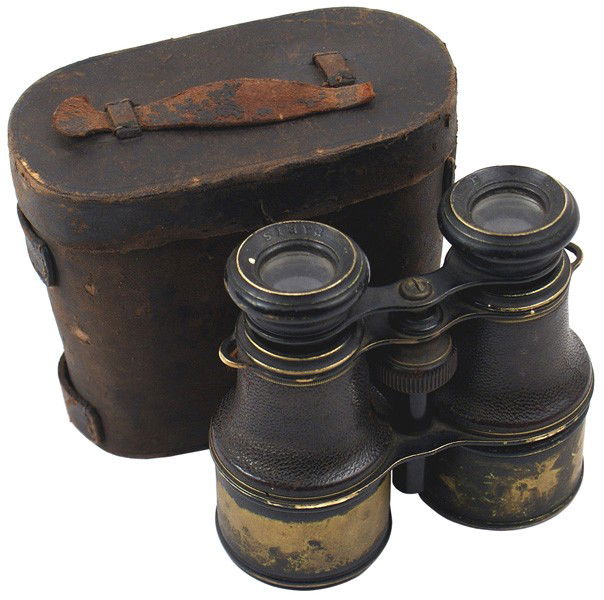 Spanish-American War Period binoculars: K-103 Spanish-American War Period binoculars. French made - with pebbled leather covering on the upper sections. Marked "VENDOME - PARIS". Small compass mounted in center adjusting stem. Surface of le