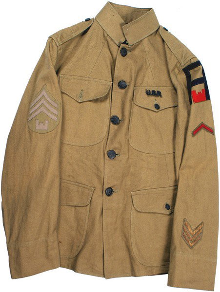 U.S. WWI summer tan four-pocket tunic: F-81 WWI summer tan four-pocket cotton tunic. 3rd Army/Engineer's insignia (large black "A" over a red silhouette of a castle). Also a service chevron and three gold o'seas stripes. Sergeant's Stripes