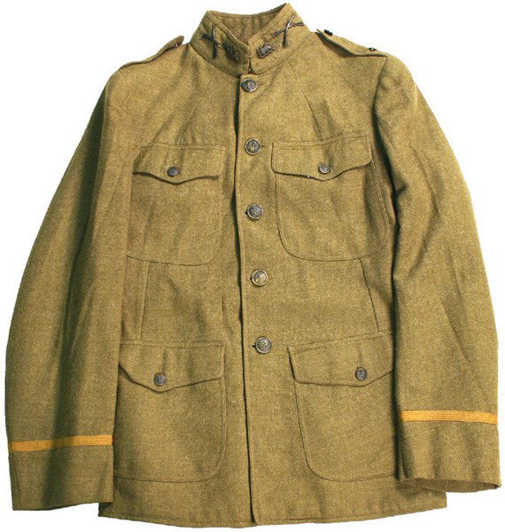 U.S. WWI Infantry Officer tunic: F-82 WWI Infantry Officer tunic. Wool O.D. four-pocket, standup collar. Has both sets of collar insignia: crossed rifles and "US/NA". Silver Captain's Bars on epaulettes. Green cloth lining. Sleeve li