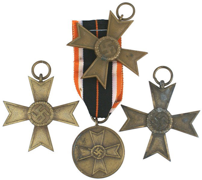 Lot of 3 German WWII War Merit medals: B-75 Lot of 3 War Merit 2nd Class Crosses without Swords. No ribbons. All rings are maker stamped: (1) "52" - firm of Gottlieb & Wagner in Idar/Oberstein. (2) "65" - firm of Klein & Quenzer A.G. in Id